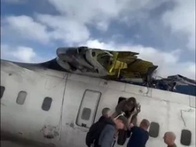 达美航空公司的一名乘客在飞机失事后倒挂在Snapchat上拍摄了可怕的画面